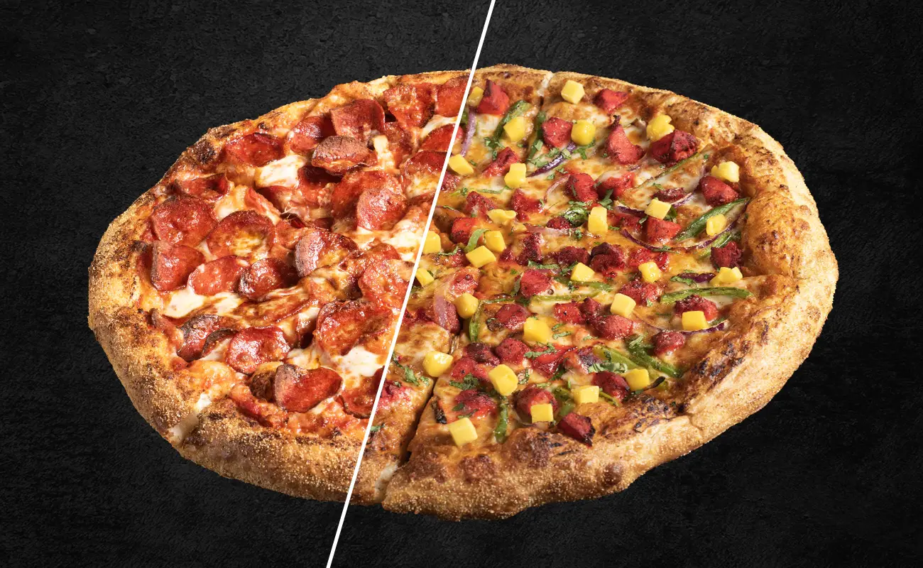 Split-screen image of a pizza showing two styles — one half with classic pepperoni and sausage toppings, the other half with colorful vegetables like bell peppers and onions, representing traditional vs. modern pizza trends