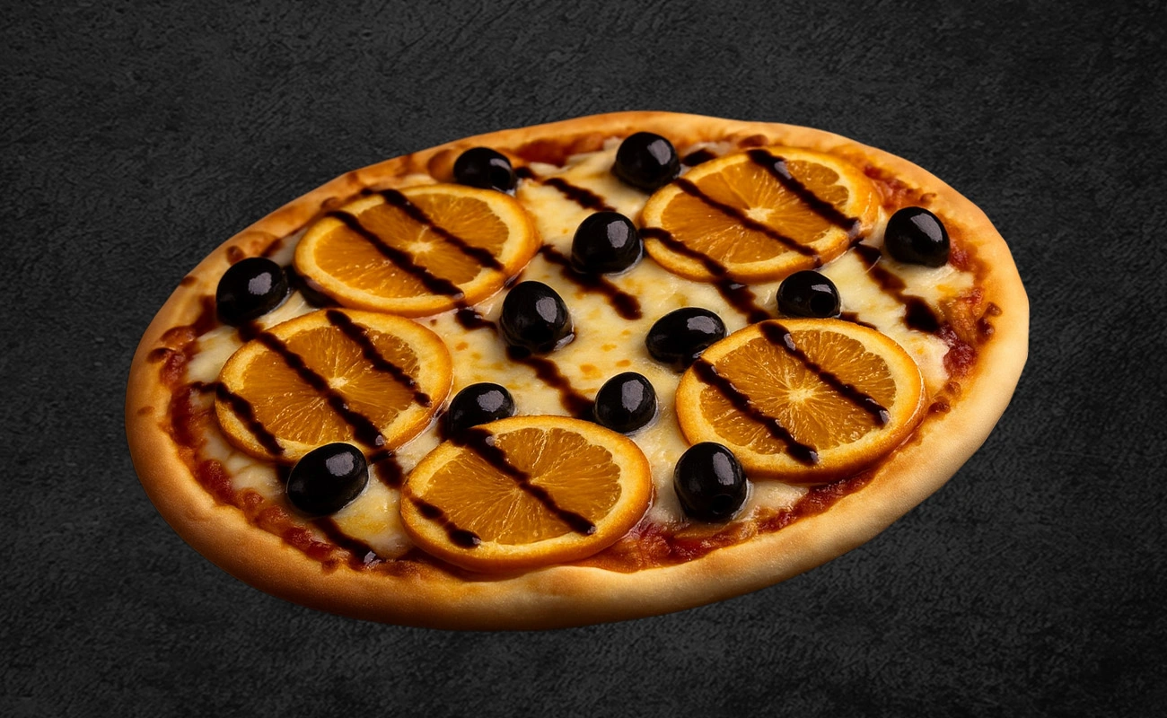 Unique pizza topped with orange slices, black olives, melted cheese, and drizzled with balsamic glaze on a dark background.